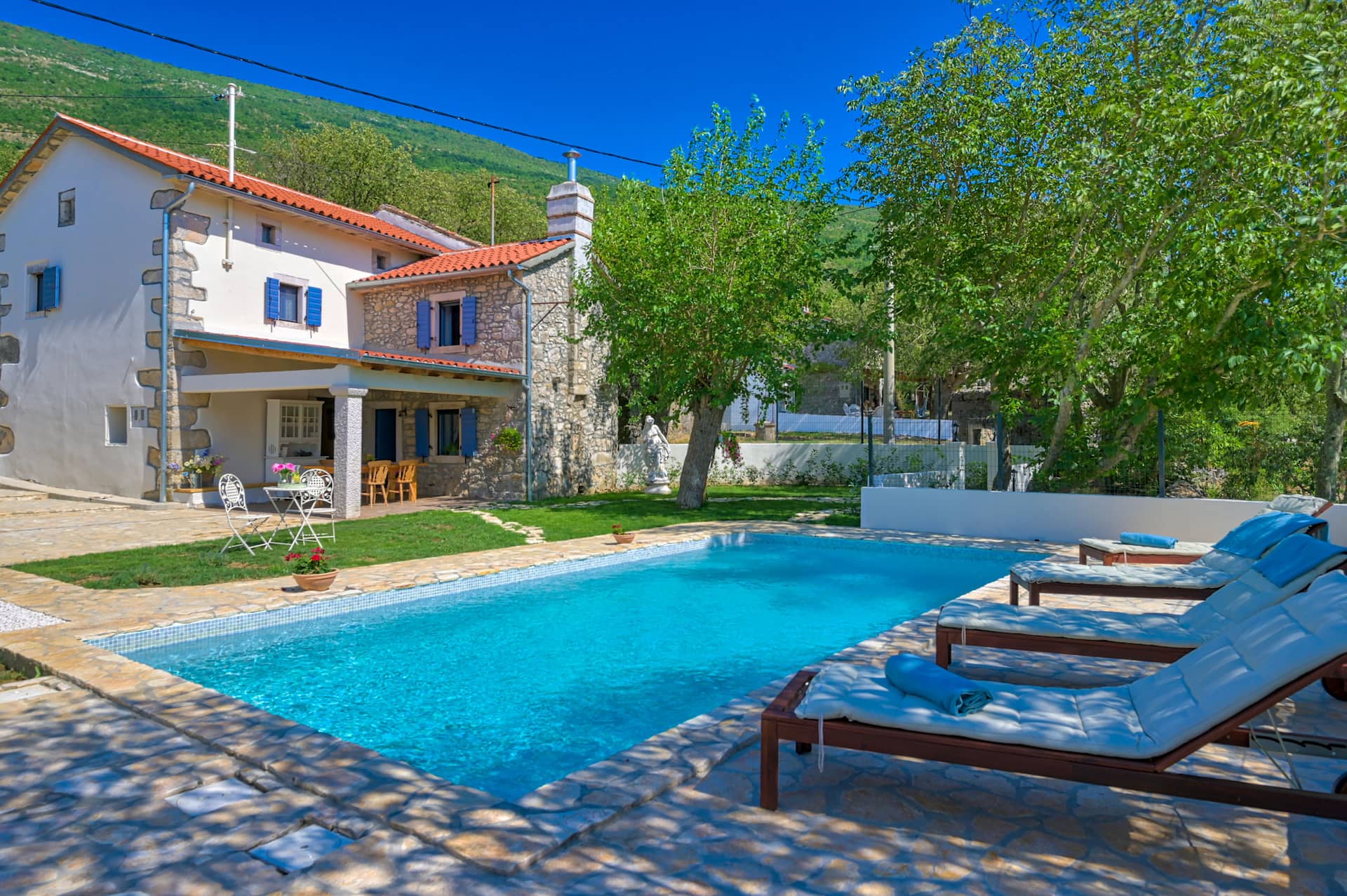 Villa Nina pool and stone house